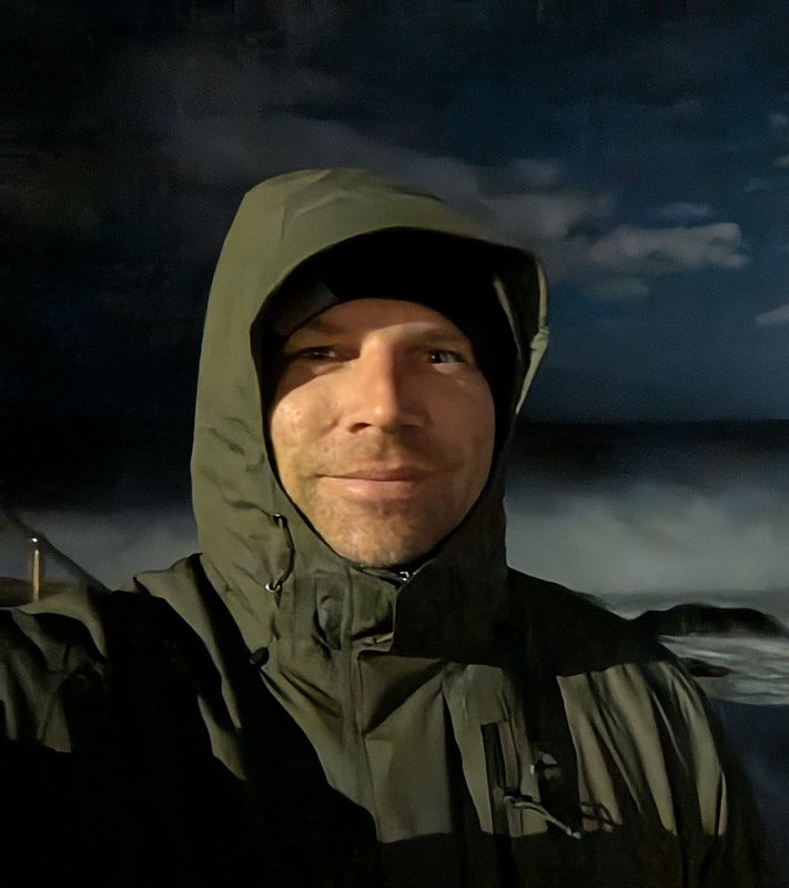 Alex McClafferty by the ocean at night